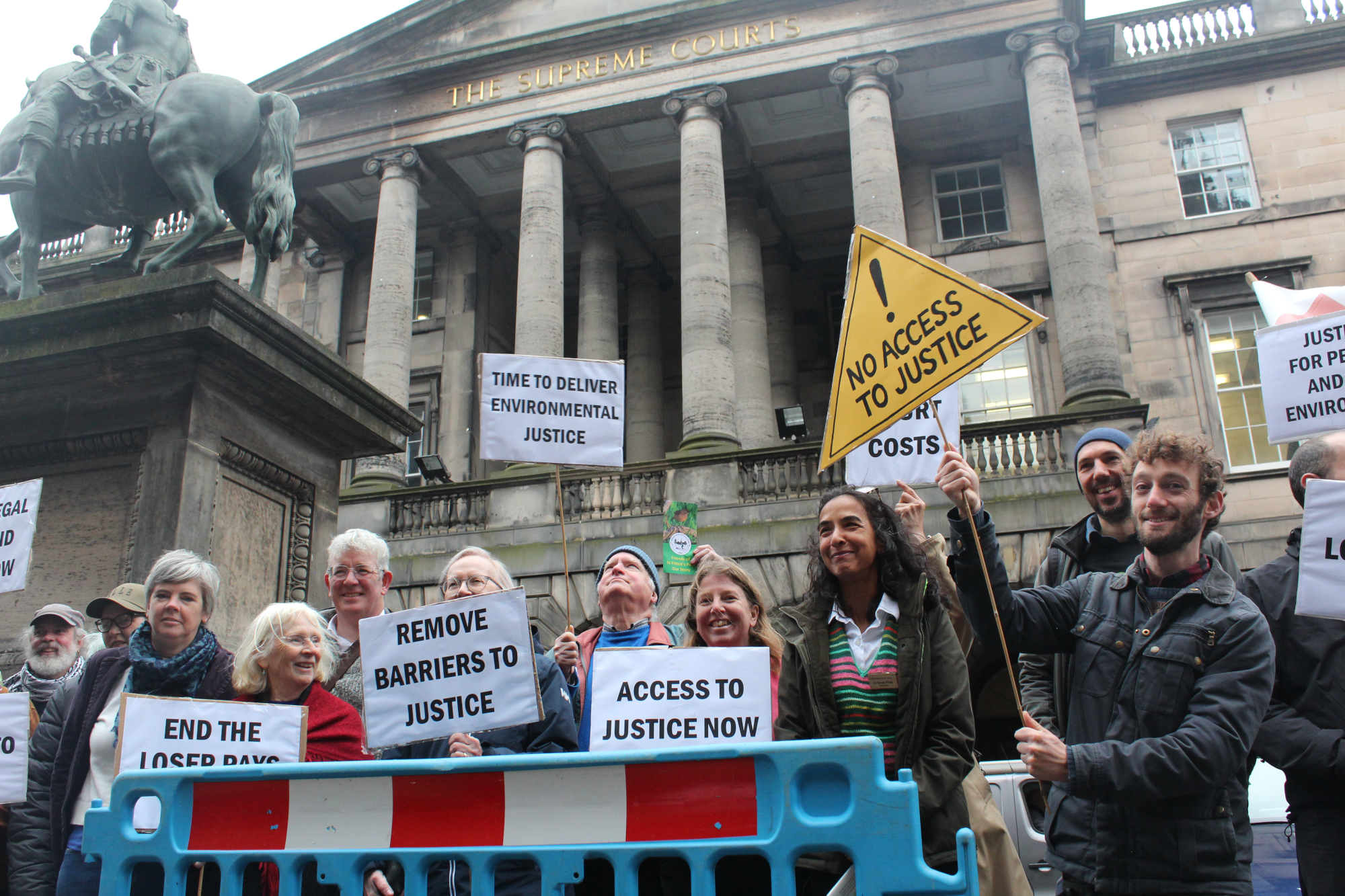 Campaigners rally outside Court of Session as Scottish government misses access to justice deadline