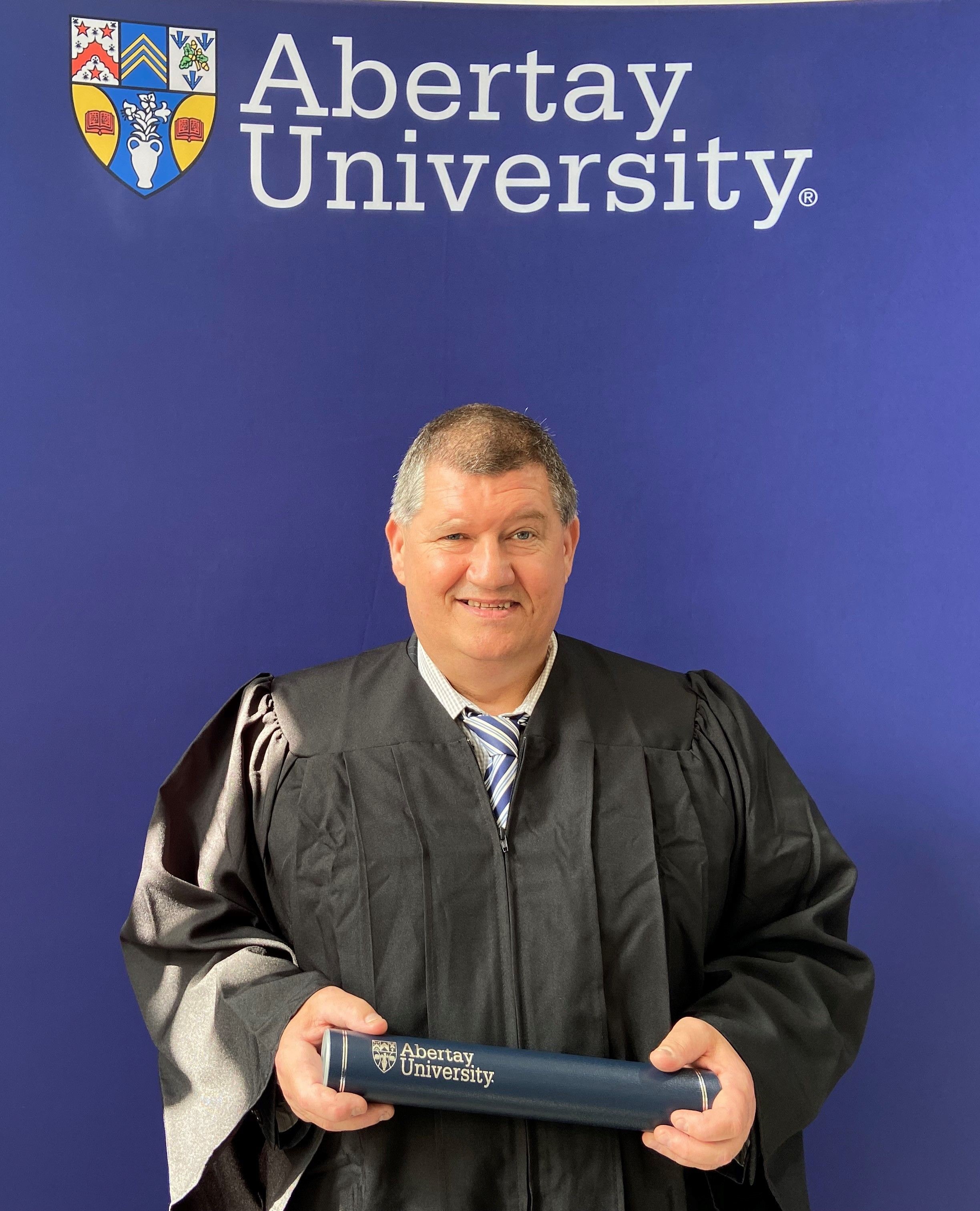 Man comes back from brink of death to earn law degree